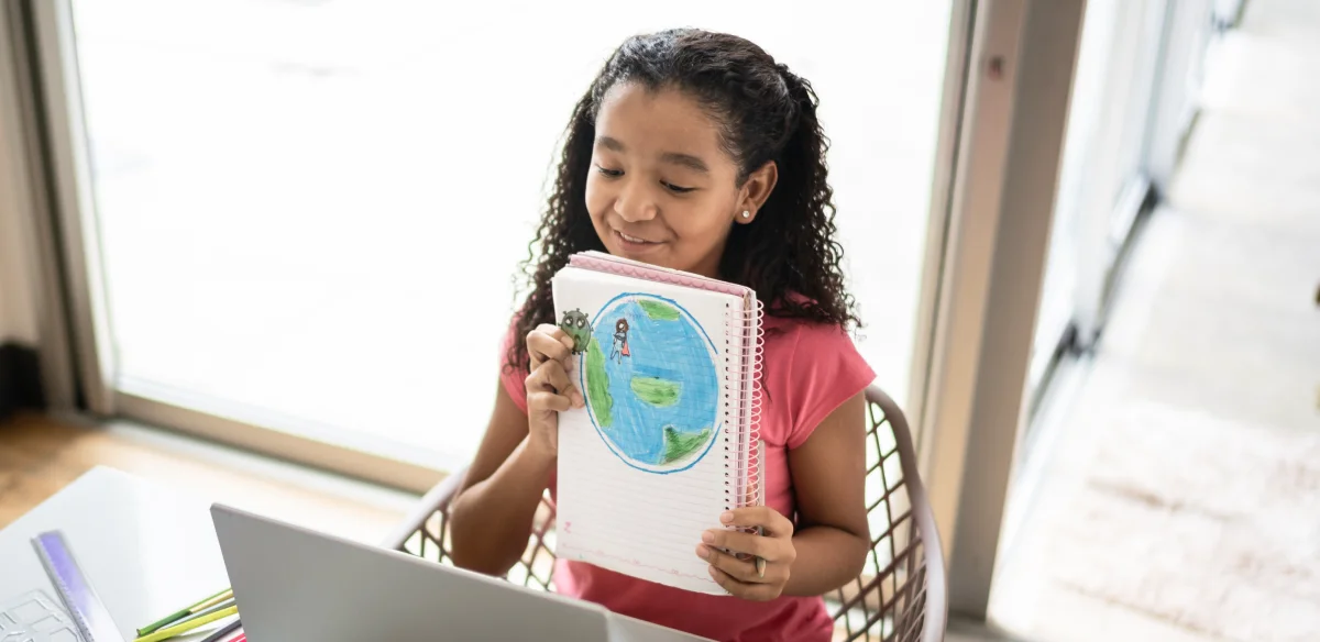 Student showing a draw to he ronline class